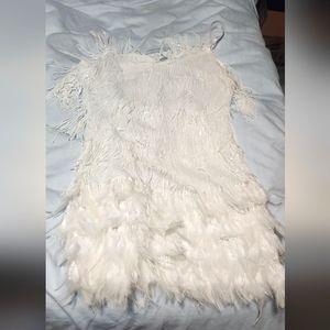White, short flapper sequin dress with feathers at the bottom. Size L